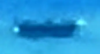 UFO photographed from a plane over London, UK 25-May-2014