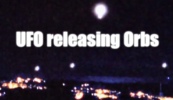 UFO releasing Orbs