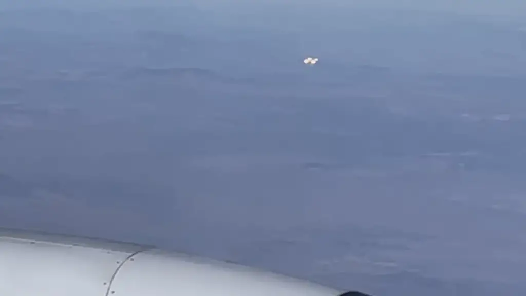 A UFO was sighted by a passenger on a Delta flight flying from Los Angeles to Atlanta at 41,000 feet. The witness captured photos & video, but the exact location & nature of the object remains unknown. 