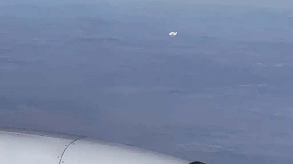 A UFO was sighted by a passenger on a Delta flight flying from Los Angeles to Atlanta at 41,000 feet. The witness captured photos & video, but the exact location & nature of the object remains unknown.